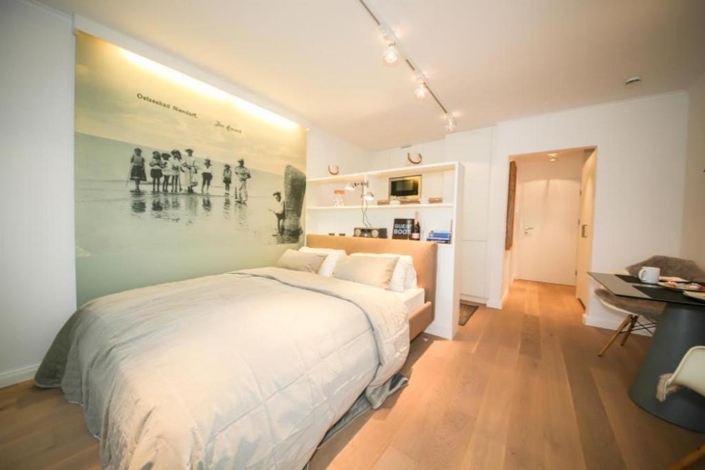 Ferienwohnung Am Strand تيميندورفير ستراند المظهر الخارجي الصورة